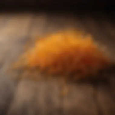 Golden saffron strands on a wooden surface